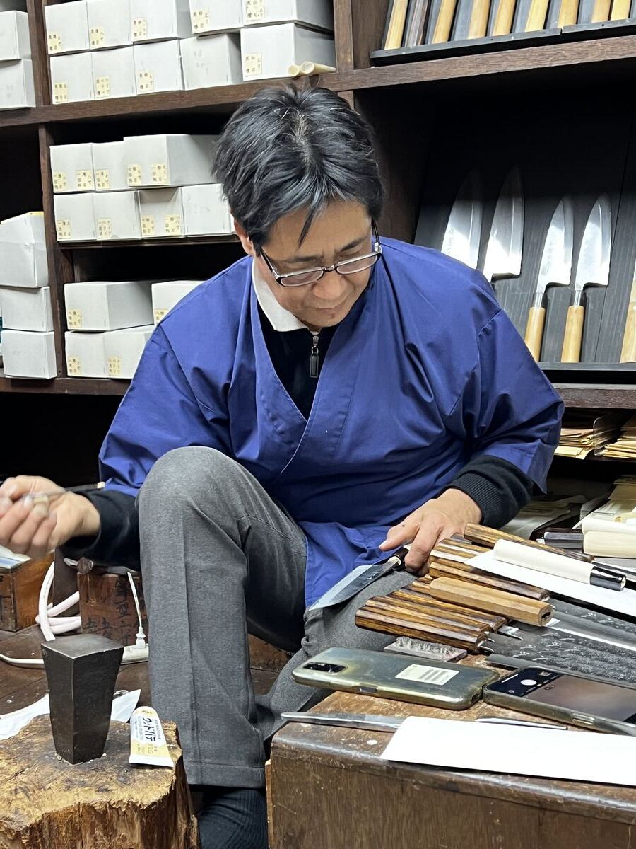 Japanese knife craftsman at work