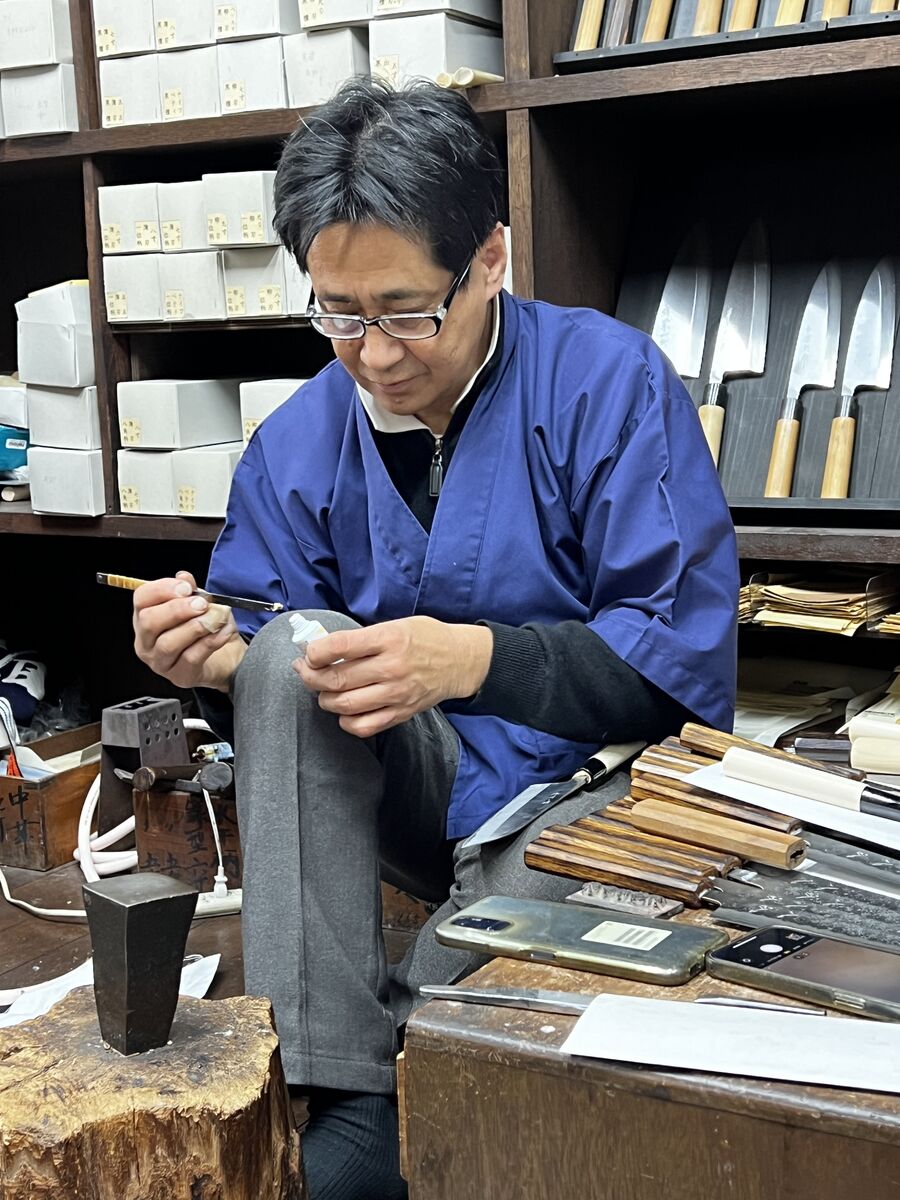 Japanese knives displayed in an artisan shop